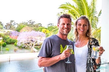 people smiling and holding drinks