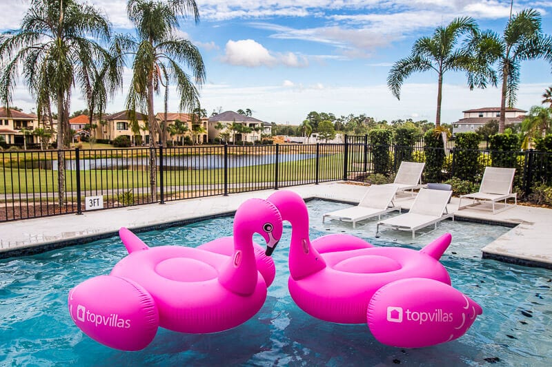 orlando-vacation-homes (42) pink flamingoes in swimming pool overlooking golf course