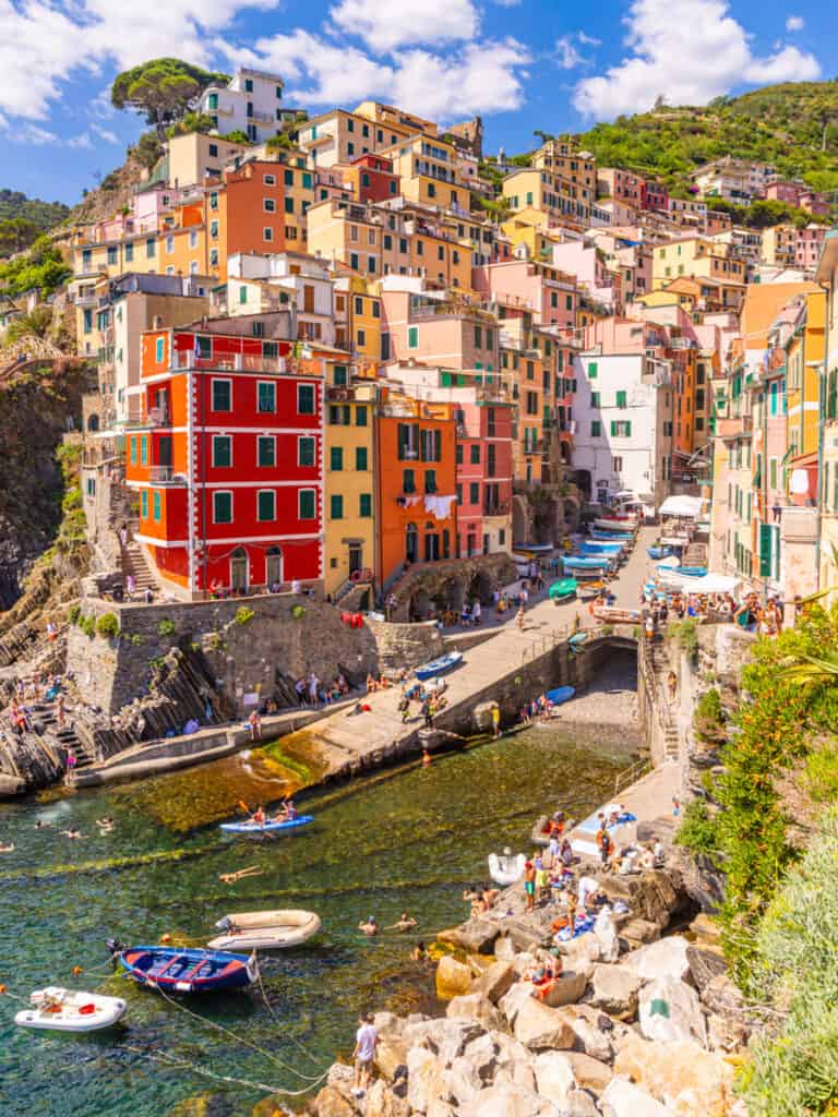 looking at harbor and colorful buildings of Riomaggiore