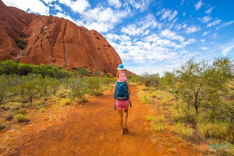 caz walking around Uluru base walk with savannah on shoulders